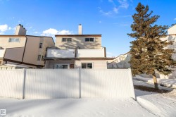 Rear view of house featuring a chimney - 