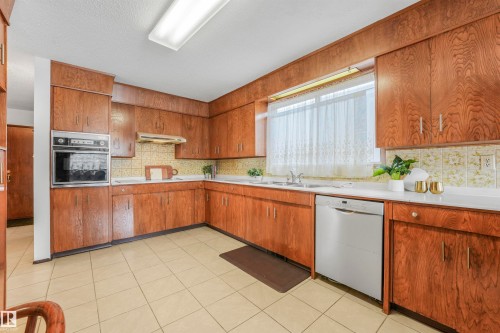 8016 73 Street, Edmonton, AB - Indoor Photo Showing Kitchen With Double Sink