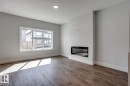 53 Sumac Close, Fort Saskatchewan, AB  - Indoor Photo Showing Living Room With Fireplace 