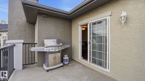 Patio / terrace with a grill - 401 636 Mcallister Loop, Edmonton, AB - Outdoor With Exterior