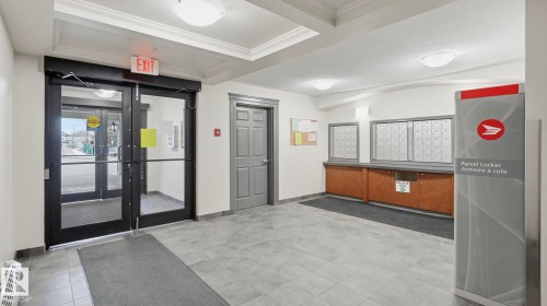 Building lobby with crown molding - 401 636 Mcallister Loop, Edmonton, AB - Indoor
