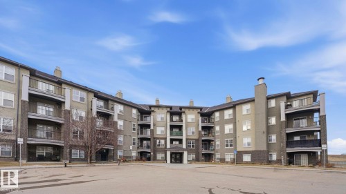 View of apartment building / complex - 401 636 Mcallister Loop, Edmonton, AB - Outdoor With Balcony With Facade