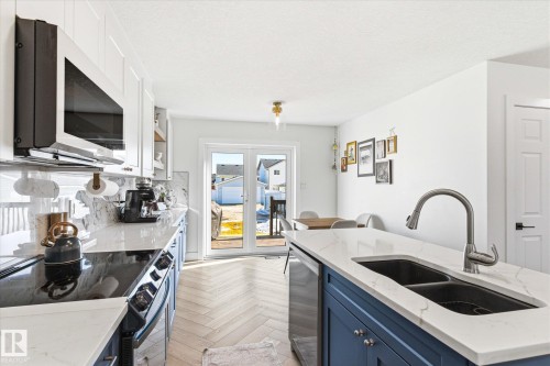 5521 Stevens Crescent, Edmonton, AB - Indoor Photo Showing Kitchen With Double Sink