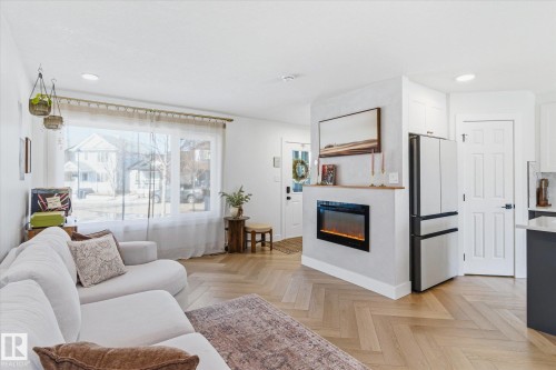 5521 Stevens Crescent, Edmonton, AB - Indoor Photo Showing Living Room With Fireplace