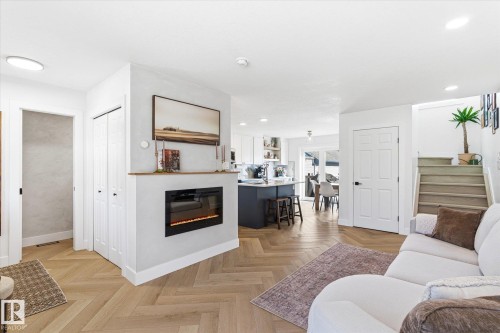 5521 Stevens Crescent, Edmonton, AB - Indoor Photo Showing Living Room With Fireplace