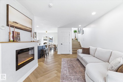 5521 Stevens Crescent, Edmonton, AB - Indoor Photo Showing Living Room With Fireplace