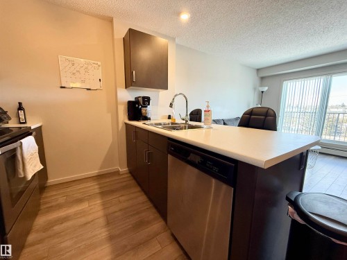 405 142 Ebbers Boulevard, Edmonton, AB - Indoor Photo Showing Kitchen With Double Sink