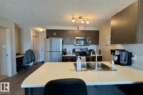405 142 Ebbers Boulevard, Edmonton, AB - Indoor Photo Showing Kitchen With Double Sink
