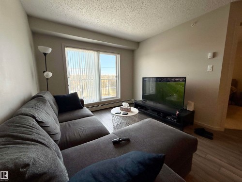 405 142 Ebbers Boulevard, Edmonton, AB - Indoor Photo Showing Living Room