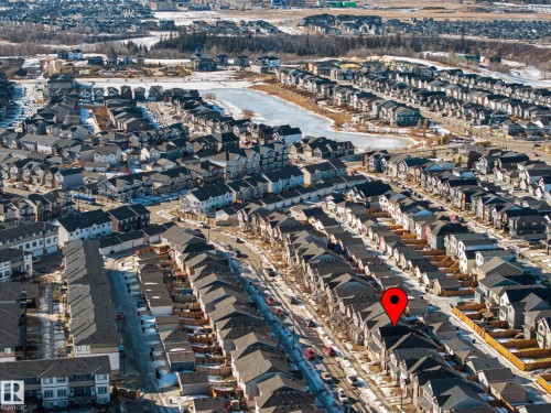 Aerial overview of property's location featuring nearby suburban area - 2577 Coughlan Road, Edmonton, AB - Outdoor With View