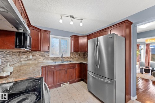 12713 116 Street, Edmonton, AB - Indoor Photo Showing Kitchen With Double Sink
