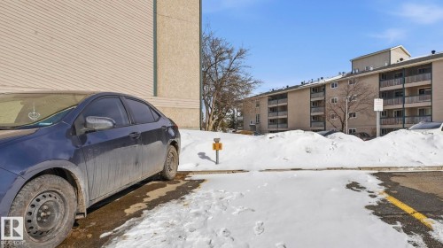 View of snow covered exterior - 103 1624 48 Street, Edmonton, AB - Outdoor With Facade