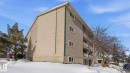 View of snow covered exterior featuring a balcony - 103 1624 48 Street, Edmonton, AB  - Outdoor 