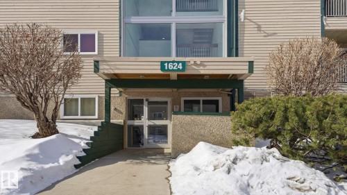View of snow covered property entrance - 103 1624 48 Street, Edmonton, AB - Outdoor