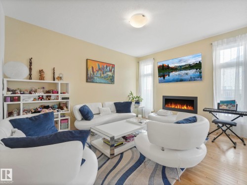 22522 98A Avenue, Edmonton, AB - Indoor Photo Showing Living Room With Fireplace
