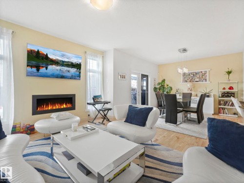 22522 98A Avenue, Edmonton, AB - Indoor Photo Showing Living Room With Fireplace