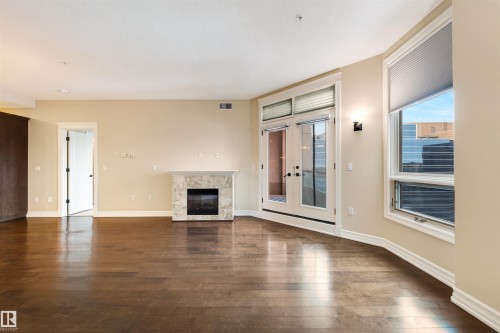 906 10142 111 Street, Edmonton, AB - Indoor Photo Showing Other Room With Fireplace
