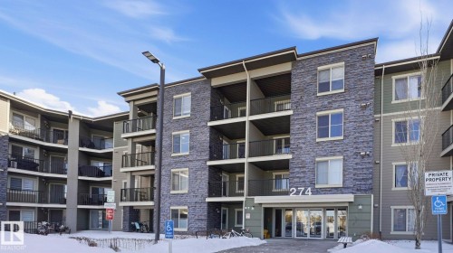 Snow covered property featuring a view of apartment building / complex - 319 274 Mcconachie Drive, Edmonton, AB - Outdoor With Balcony With Facade