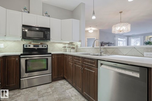 105 2503 Hanna Crescent, Edmonton, AB - Indoor Photo Showing Kitchen With Double Sink With Upgraded Kitchen
