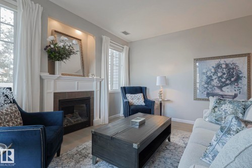 105 2503 Hanna Crescent, Edmonton, AB - Indoor Photo Showing Living Room With Fireplace
