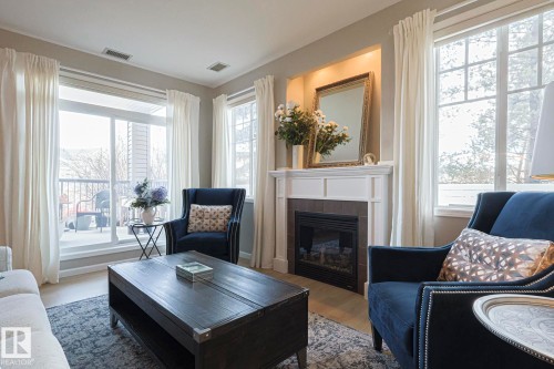 105 2503 Hanna Crescent, Edmonton, AB - Indoor Photo Showing Living Room With Fireplace