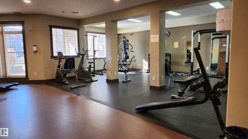 First Floor Fitness Room - 105 2503 Hanna Crescent, Edmonton, AB - Indoor Photo Showing Gym Room