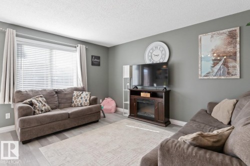 97 Keystone Crescent, Leduc, AB - Indoor Photo Showing Living Room