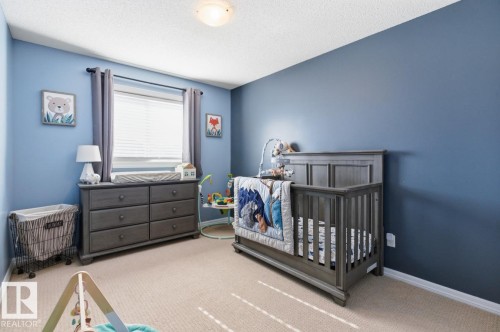 97 Keystone Crescent, Leduc, AB - Indoor Photo Showing Bedroom
