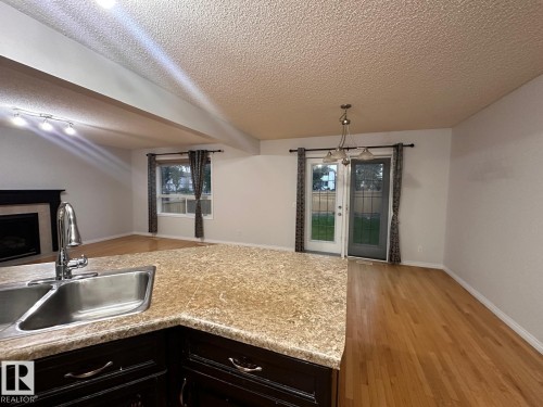 1569 37A Avenue, Edmonton, AB - Indoor Photo Showing Kitchen With Double Sink