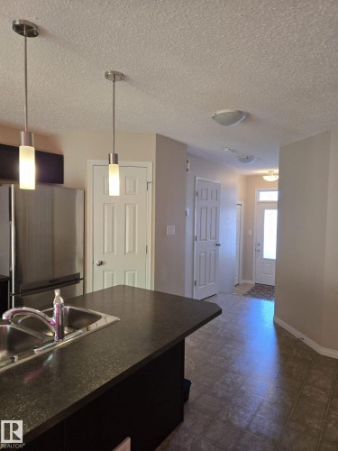 4705 Crabapple Run Run, Edmonton, AB - Indoor Photo Showing Kitchen With Double Sink