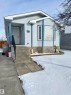 The property features light blue siding, a covered porch entry, and a bay window - 41 Graywood Cove, Stony Plain, AB  - Outdoor 
