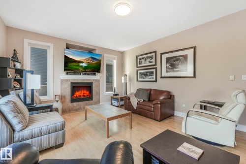 46 Willowdale Place, Stony Plain, AB - Indoor Photo Showing Living Room With Fireplace