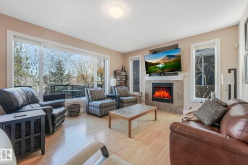 46 Willowdale Place, Stony Plain, AB - Indoor Photo Showing Living Room With Fireplace