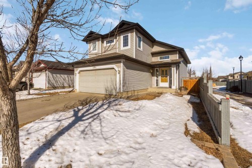 View of front facade featuring driveway and a garage - 20604 48 Avenue, Edmonton, AB - Outdoor