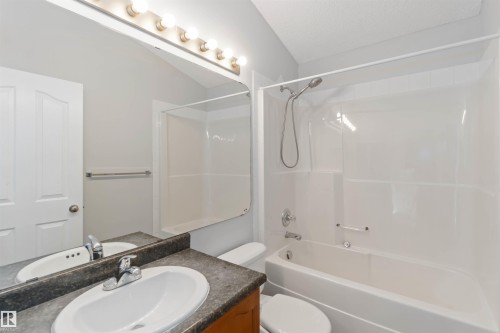 Bathroom featuring vanity and shower / tub combination - 20604 48 Avenue, Edmonton, AB - Indoor Photo Showing Bathroom