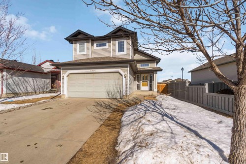 View of front facade featuring driveway and a garage - 20604 48 Avenue, Edmonton, AB - Outdoor