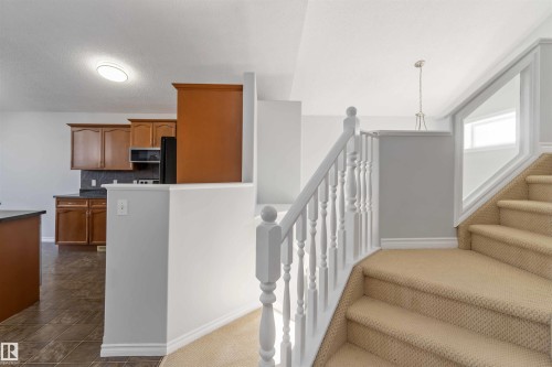 Staircase featuring baseboards and carpet floors - 20604 48 Avenue, Edmonton, AB - Indoor