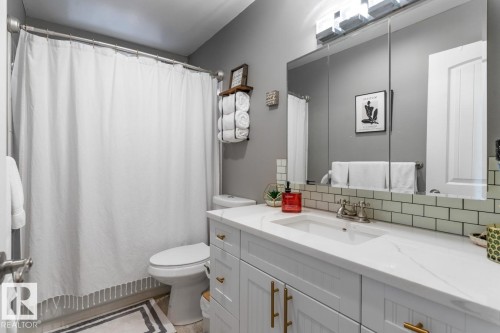 Bathroom featuring vanity and a shower with shower curtain - 14 Lester Crescent, St. Albert, AB - Indoor Photo Showing Bathroom