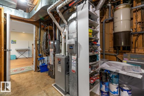 Utilities featuring gas water heater and heating unit - 14 Lester Crescent, St. Albert, AB - Indoor Photo Showing Basement