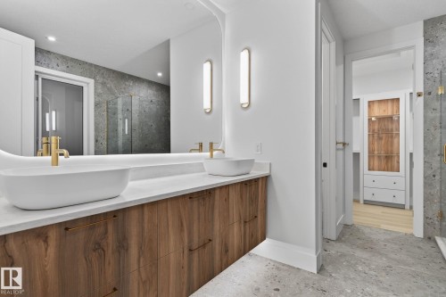 Bathroom with a marble finish shower and double vanity - 8765 Mayday Lane, Edmonton, AB - Indoor