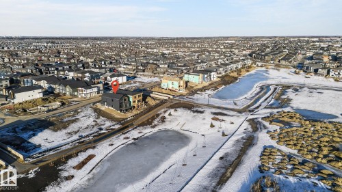Snowy aerial view with a residential view - 8765 Mayday Lane, Edmonton, AB - Outdoor With View
