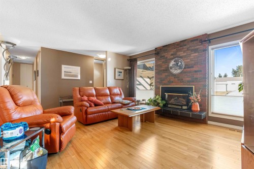 12127 152A Avenue, Edmonton, AB - Indoor Photo Showing Living Room With Fireplace