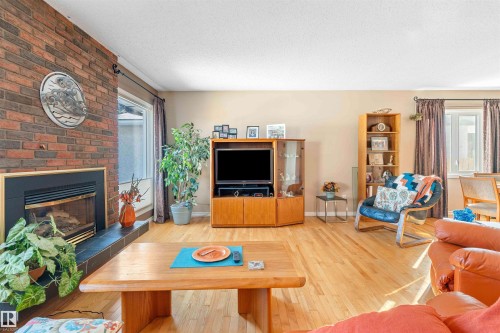 12127 152A Avenue, Edmonton, AB - Indoor Photo Showing Living Room With Fireplace