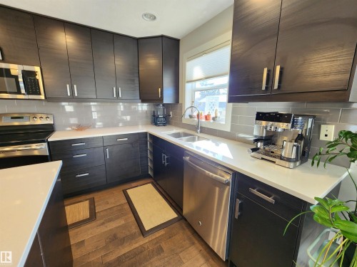 10433 70 Avenue, Edmonton, AB - Indoor Photo Showing Kitchen With Double Sink With Upgraded Kitchen