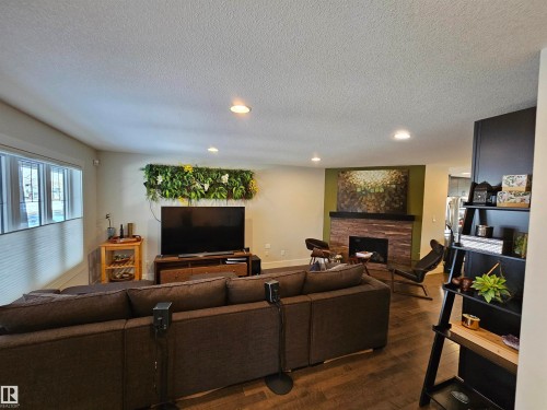 10433 70 Avenue, Edmonton, AB - Indoor Photo Showing Living Room With Fireplace