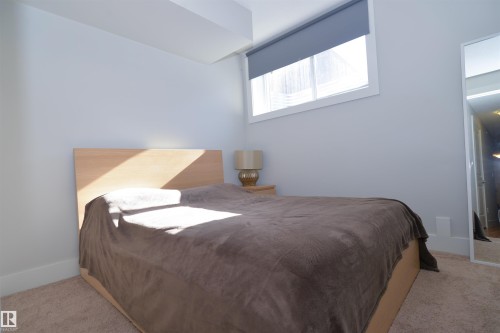 10433 70 Avenue, Edmonton, AB - Indoor Photo Showing Bedroom