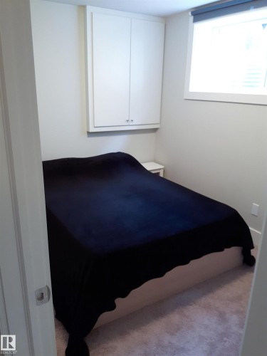 10433 70 Avenue, Edmonton, AB - Indoor Photo Showing Bedroom