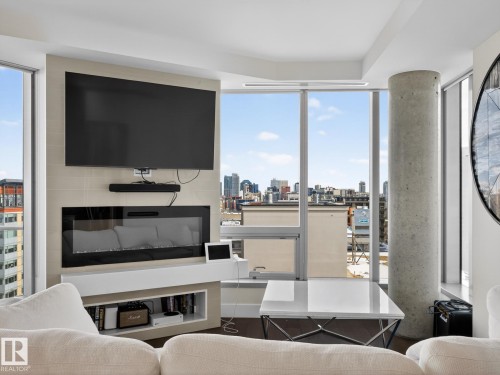 1401 11969 Jasper Avenue, Edmonton, AB - Indoor Photo Showing Living Room With Fireplace