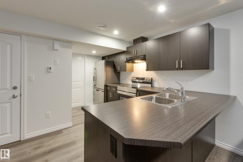 5112 Lark Crescent, Edmonton, AB - Indoor Photo Showing Kitchen With Double Sink