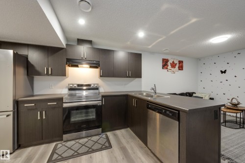 5112 Lark Crescent, Edmonton, AB - Indoor Photo Showing Kitchen With Stainless Steel Kitchen With Double Sink